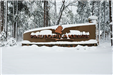 Pinetop-Lakeside Sign Covered with Snow