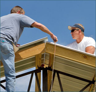 Two Men Working on a Building Project